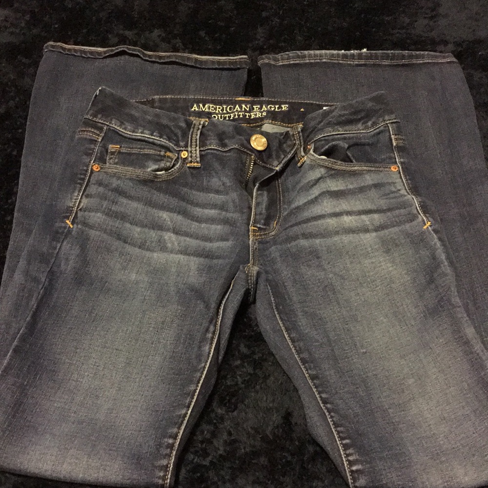Dark-wash flare jeans.
